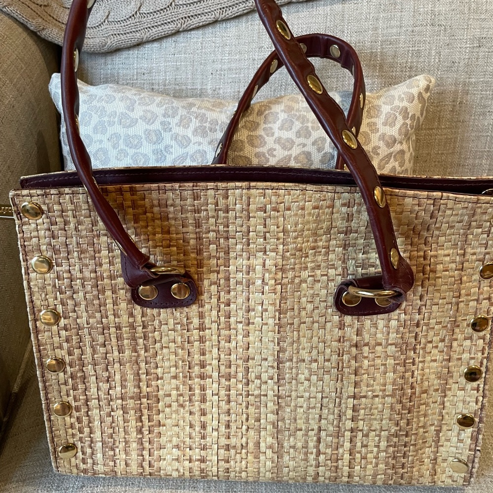 Hammitt handbag, straw-like material, burgundy leather with gold details.